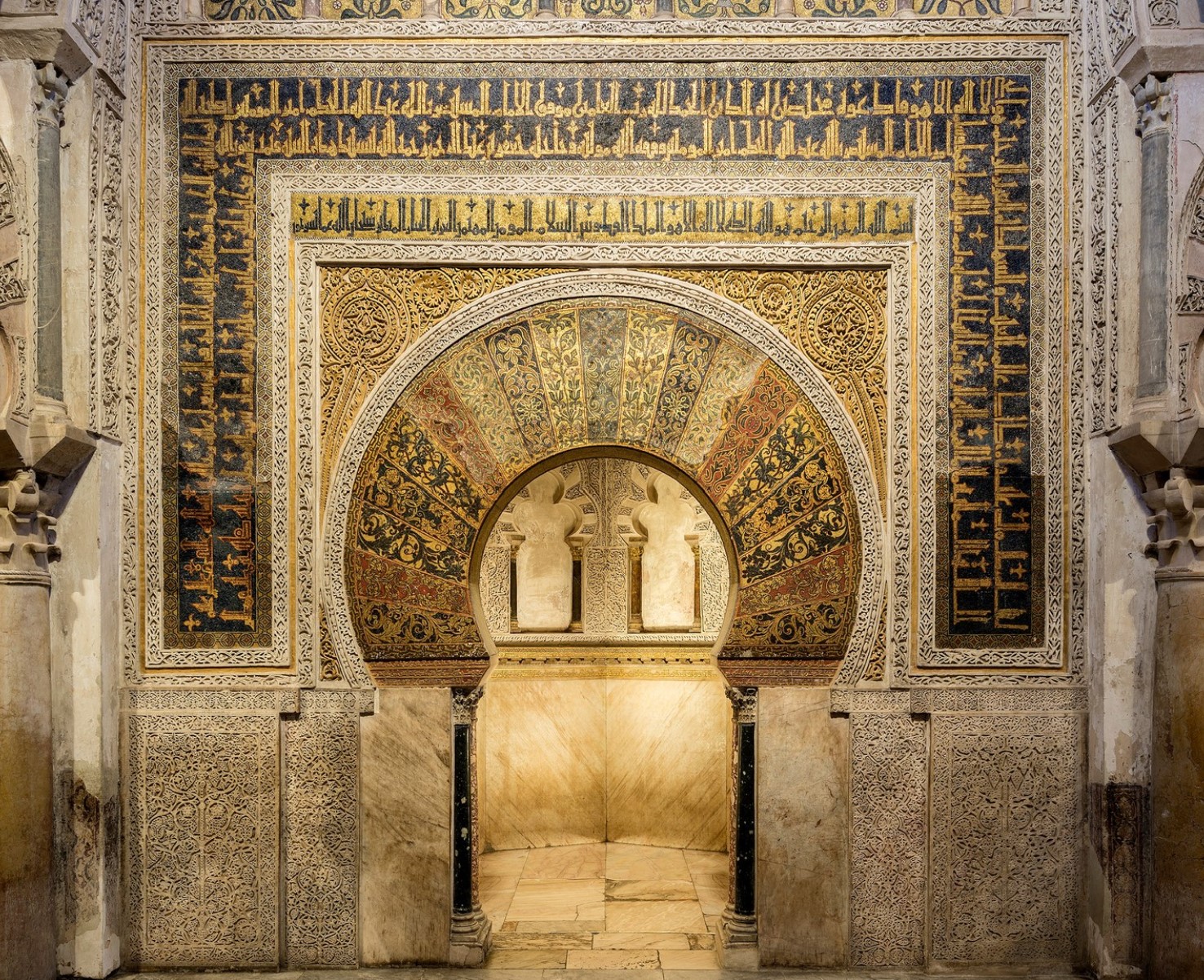 The focal point in the prayer hall is the horseshoe arched mihrab or prayer niche. A mihrab is used in a mosque to identify the wall that faces Mecca