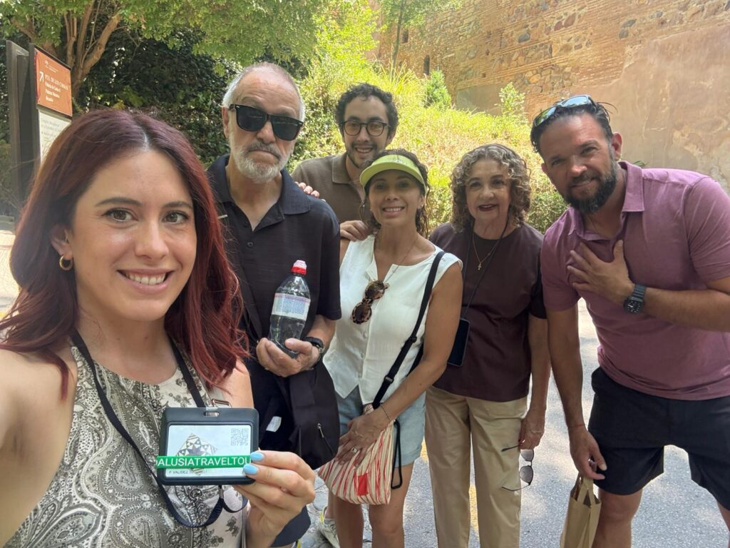 Group of tourists taking photos during an Andalusia vacation